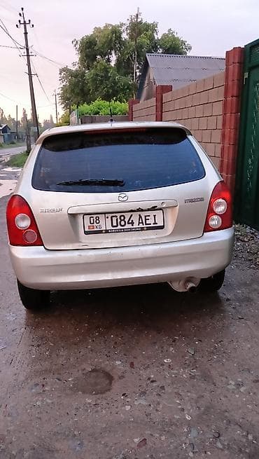 Транспорт: Mazda 323: 2003 г., 1.6 л, Кол менен иштөөчү, Бензин, Хетчбек — 3