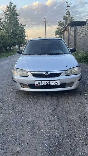 Mazda 323: 1999 г., 1.5 л, Механика, Бензин, Хэтчбэк