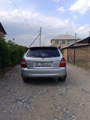 опел зафира б: Mazda 323: 2001 г., 1.6 л, Механика, Бензин, Хэтчбэк — 7