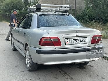 e55 compressor: Mitsubishi Carisma: 2002 г., 1.6 л, Механика, Бензин, Седан — 3