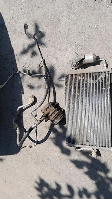 Унаа тетиктери: Комплект деталей кондиционера для автомобиля. В составе: - Компрессор — 1
