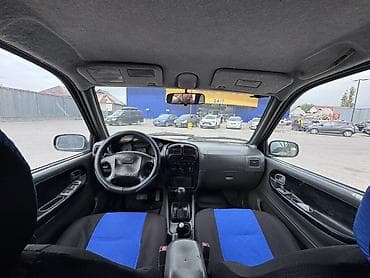 Kia Sportage: 2001 г., 2 л, Автомат, Газ, Кроссовер — 5