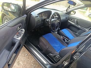 моторчик печки 124: Mazda 323: 2001 г., 2 л, Механика, Бензин, Хэтчбэк — 9