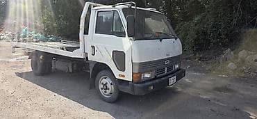 down pipe: Эвакуатор, Kia, 1995 г., Прямая — 1