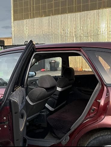 авто мазда: Mazda Familia: 1998 г., 1.5 л, Ручные, Бензин, Универсал — 6