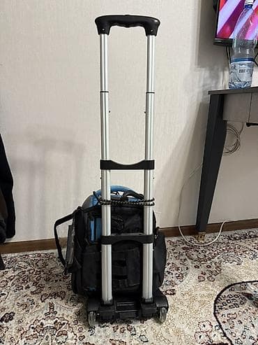 Портативная тележка-трансформер с выдвижной ручкой для перевозки