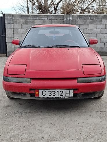 чип е34: Mazda 323: 1993 г., Механика, Бензин, Хэтчбэк — 4