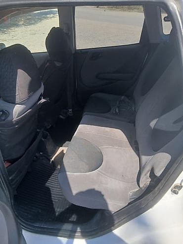 салон автомобиля: Honda Fit: 2003 г., 1.3 л, Автомат, Бензин, Хэтчбэк — 7