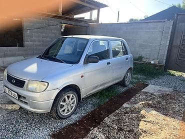 зеркало большие: Daihatsu Cuore: 2002 г., 1 л, Механика, Бензин, Хэтчбэк — 1