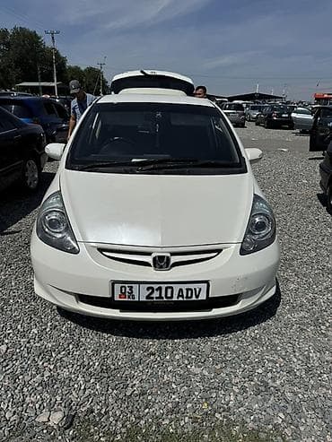 авто прикуриватель: Honda Fit: 2003 г., Хэтчбэк — 1