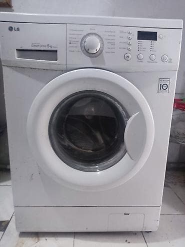 macbook air: Стиральная машина LG, фронтальная загрузка, инверторный Direct Drive — 1