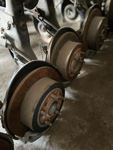 очень нужны: Toyota Ipsum Задние балки в сборе в наличии Тойота Ипсум Объем 2.4 — 7