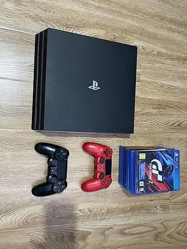 PlayStation 4 Pro 1 ТБ (Jet Black, CUH-7216B) + 2 геймпада + набор игр