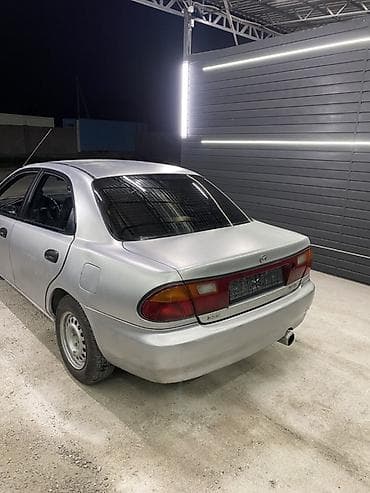 мзда 323: Mazda Familia: 1995 г., 1.6 л, Механика, Бензин, Седан — 10