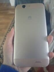 Huawei G7010, Б/у, 16 ГБ, цвет - Бежевый, 2 SIM