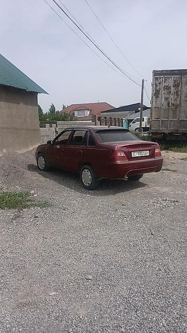 Daewoo Nexia: 2011 г., Седан — 4