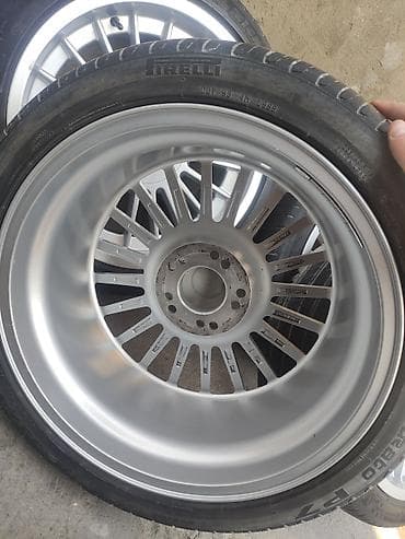 Дөңгөлөктөр монтажда 40 / R 18, Колдонулган, тешиктери - 5 — 7