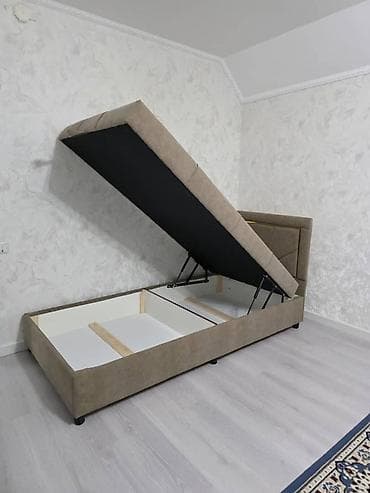 хранение: Односпальная кровать с подъемным механизмом и вместительным коробом — 2