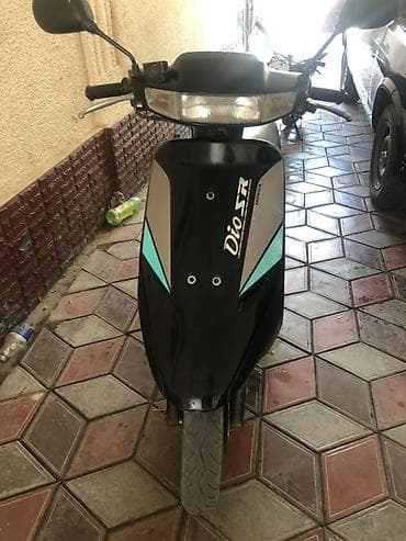 Скутер Honda Dio SR - Кузов: наклейками Dio SR. - Двигатель