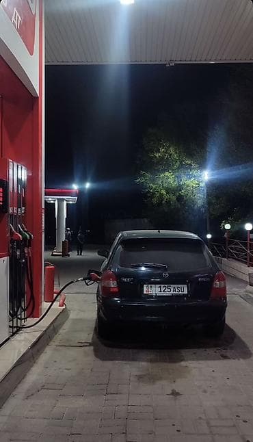 kia besta: Mazda Familia: 1999 г., 1.6 л, Ручные, Бензин, Седан — 5