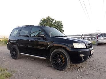 car kg: Mazda Tribute: 2004 г., 2.3 л, Механика, Бензин, Кроссовер — 1