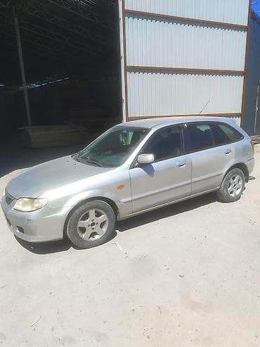 метиз 1: Mazda 323: 2002 г., 1.6 л, Механика, Бензин, Универсал — 2