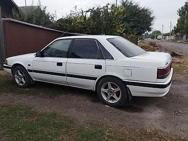 Транспорт: Mazda 626: 1989 г., 2 л, Механика, Газ, Седан — 2