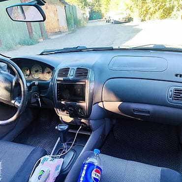 бутка бу: Mazda Familia: 2002 г., 1.6 л, Автомат, Бензин, Седан — 8
