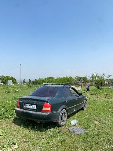мазда демио задний стоп: Mazda Familia: 2001 г., 2 л, Автомат, Бензин, Седан — 3