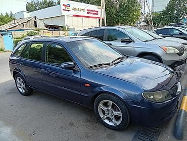 Mazda 323: 2002 г., 1.6 л, Механика, Бензин, Универсал