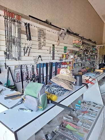 катушка для рыбалки: Магазин «Всё для рыбалки» Ассортимент: - Удилища разных типов и длин — 5