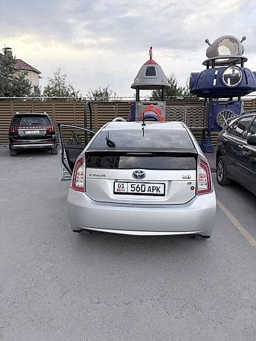 byd e2 2023: Toyota Prius: 2013 г., Автомат, Гибрид, Хэтчбэк — 4