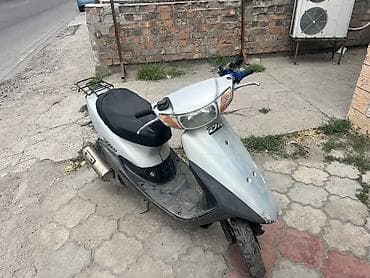 dd oo: Скутер Honda Dio (серебристый) - Кузов: компактный городской скутер с — 1