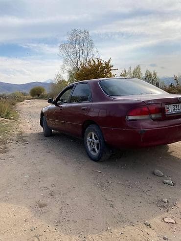 арзан матиз 1: Mazda 2: 2001 г., Кол менен иштөөчү, Бензин — 7