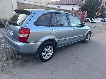 Транспорт: Mazda 323: 2001 г., 1.6 л, Механика, Бензин, Универсал — 2