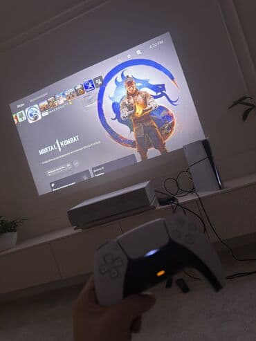 смарт тв бокс: 4К проектор OPTOMA CinemaX D2 в комплекте вместе Apple TV 4K 64GB,это — 2