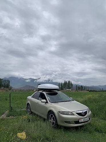 эшке: Mazda 6: 2004 г., 2 л, Кол менен иштөөчү, Бензин, Седан — 7