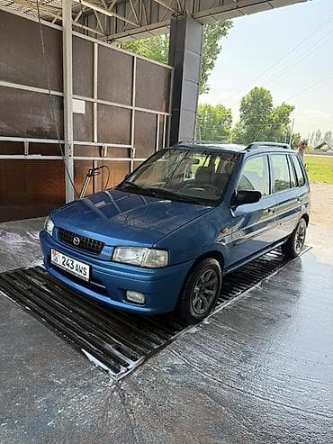 Mazda Demio: 1999 г., 1.3 л, Механика, Бензин, Универсал