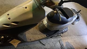 dd oo: Скутер Honda Dio (серебристый) - Компактный городской скутер с — 1