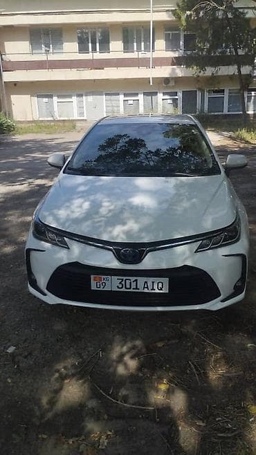 Toyota Corolla: 2021 г., 1.8 л, Вариатор, Гибрид, Седан