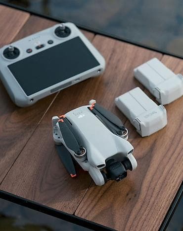 параплан купить: DJI Mini 3 + пульт DJI RC (с экраном) — комплект для аэрофото и видео — 2