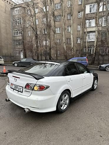 выхлопная трасса: Mazda Atenza: 2003 г., 2.3 л, Типтроник, Бензин, Лифтбек — 4
