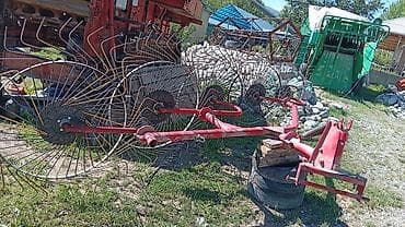 Транспорт: Грабли-ворошилки колесно-пальцевые, прицепные к трактору. Описание: - — 3