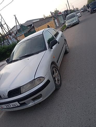 муссо санёнг: Mitsubishi Carisma: 2002 г., 1.6 л, Механика, Бензин, Седан — 4
