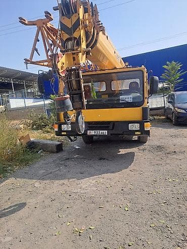 аренда помещения под кухню: Услуги автокрана. - Колёсный автокран жёлтого цвета, телескопическая — 2