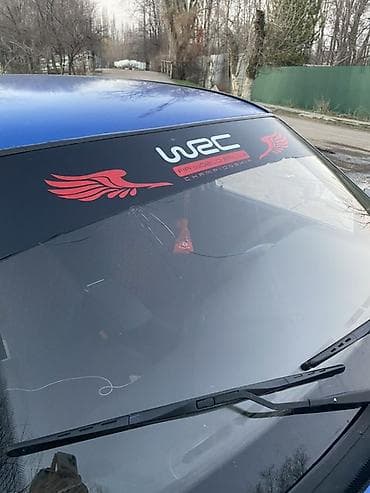 стеклоподъёмник 124: Седан синего цвета с тонировкой задних стекол и черными некрашеными — 1