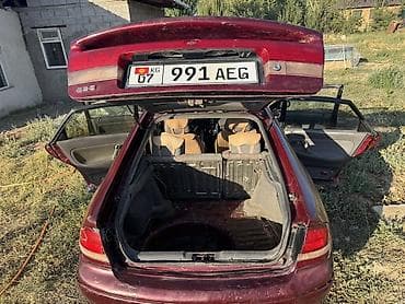 авто для такси: Mazda 626: 1994 г., 2 л, Механика, Бензин, Лифтбек — 3