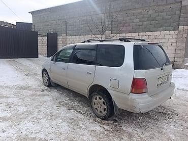kia k 8: Honda Odyssey: 1996 г., Минивэн — 7