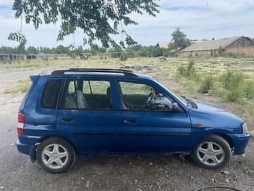 авто крепежи: Mazda Demio: 1999 г., 1.3 л, Механика, Бензин, Хэтчбэк — 2