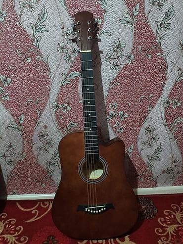 Акустическая гитара дредноут с вырезом (cutaway) - Корпус